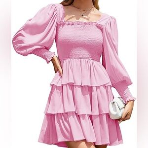 pink puff sleeve shirred tiered smock mini dress.